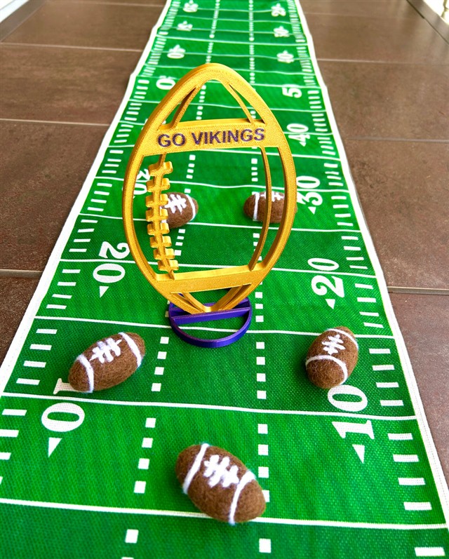 3D printed football centerpiece with team colors